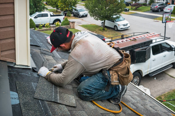 Professional Emergency Roof Repair technician working in Wading River, NY